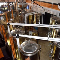 Glass-encased centrepiece brewhouse