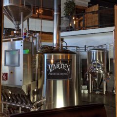 Glass-encased centrepiece brewhouse